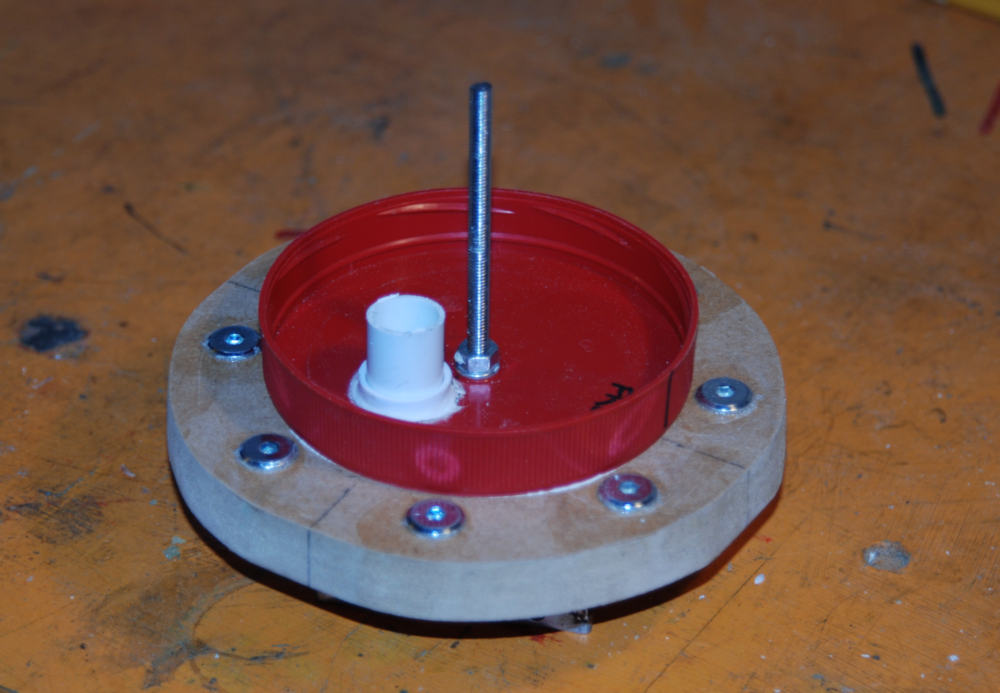 The polyclamp that connects the integrating sphere to the rest of the Photonic Instrument.